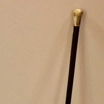 Wooden Walking Stick with plastic tortoise shell handle, before 1968