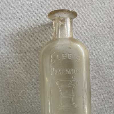 Clear glass Bottle from Elbe's Pharmacy, c. 1900
