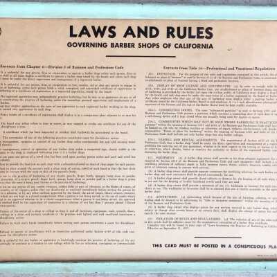 Laws and Rules in wooden frame painted pale green, from Frank's Barber Shop
