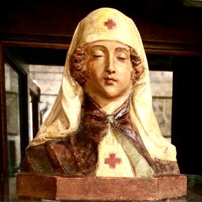 Cast plaster of Paris bust of a WWI Red Cross Nurse, 1917-19118