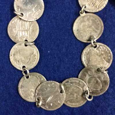 Bracelet of 10 changed coins joined by single loops, c. 1880s