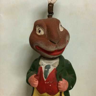 Plaster-of-Paris and papier-mâché clothed Easter rabbit candy container