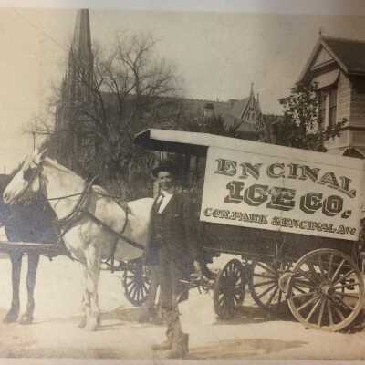 Encinal Ice Company delivery wagon, and old St. Joseph's, c. 1910-1912