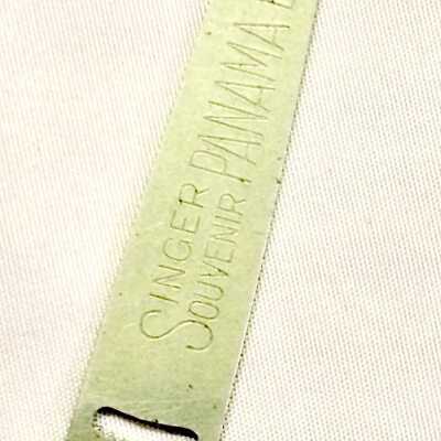 Singer Souvenir Nickel plated ribbon threader from Panama Exposition 1915