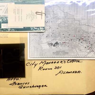 Envelope with map of location of families leaving Estuary project housing, 1964