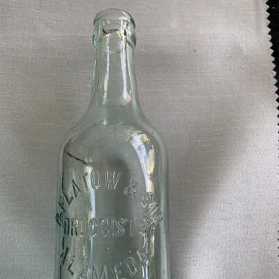 Advertising bottle from P. Flatow & Son, druggist, c. early 1900s