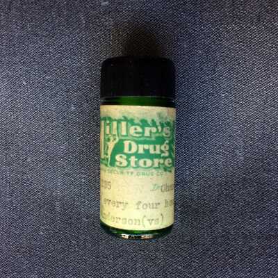 Green Medicine bottle from Miller's Drug Store, 1938