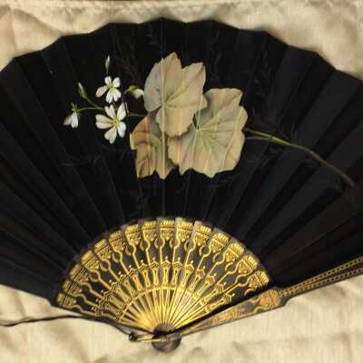 Black silk fan with hand-painted geranium leaves, c. 1890