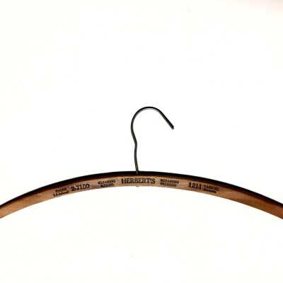 Wooden Clothes hangers issued by Herbert's Dry Cleaners, prior to 1970