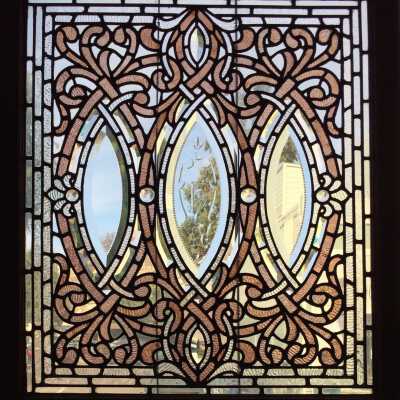 Leaded glass window from stair landing of Herbert mansion, 1878-1893