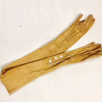 Pair of Tan Suede gloves with mother-of-pearl buttons and accent stitching