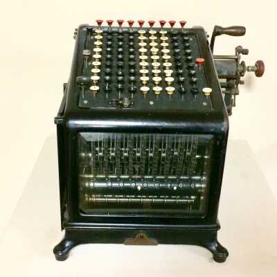 Adding machine in metal case from the Loop Lumber Co., c. 1920s