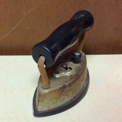 Dover child's toy sad iron found at 2849 Jacson Street, c. early 1900s