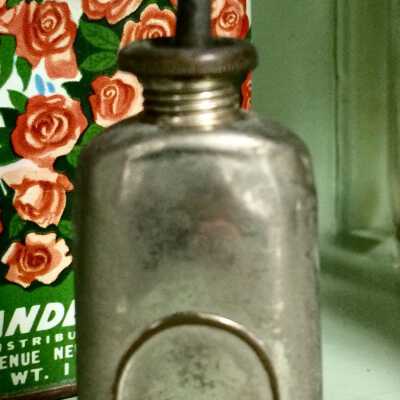 Nickel-plated oil container from Frank's Barber Shop
