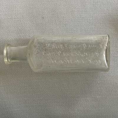 White Cross Drug Co. medicine bottle found on the golf course site, c. early 1900s