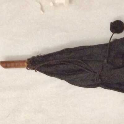 Black silk parasol with floral design and fumed bamboo handle, c. 1893
