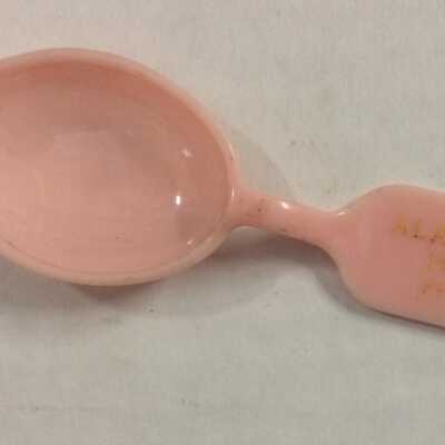 Pink plastic medicine spoon from the Alameda Drug Company, prior to 1970