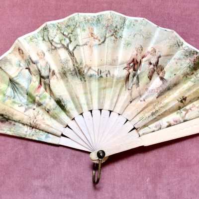 Colored paper fan with 18th century dancers and carved stays, early 1900s