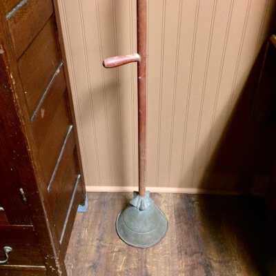 Circular Galvanized metal 'Rapid Washer' plunger with wooden handle