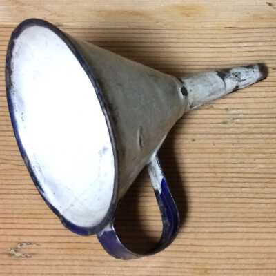 White enamel funnel with dark blue rim and handle, c. 1920s