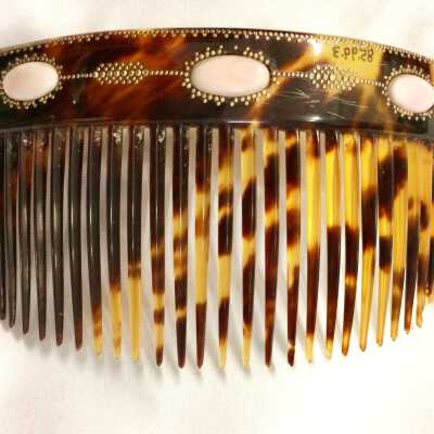 Tortoise shell hair comb with gold beading and imitation pink coral, early 1900s