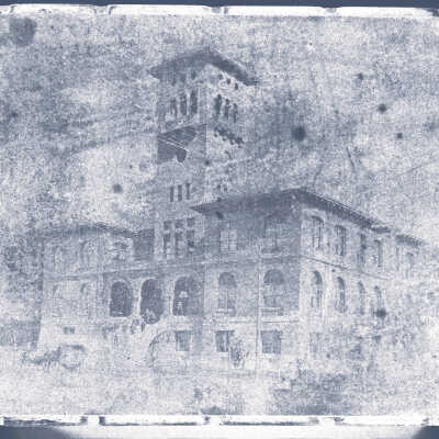 manipulated image: image edited to silvertone, hightened contrast, hightened highlights, then flipped and colors inverted.
