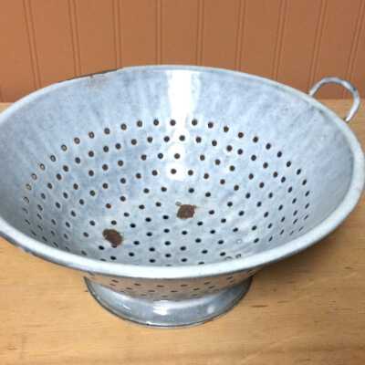 Graniteware colander with molten grey & white enamel, before 1920