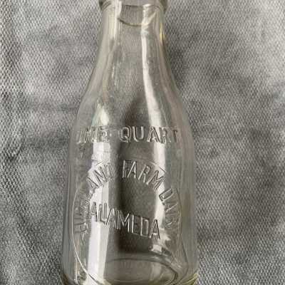 Quart Milk bottle from Highland Farm Dairy, 1910-1922