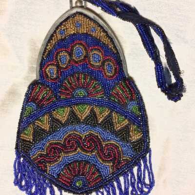 Beaded purse of art deco-like design of red, blue, black and green beads, c. 1920