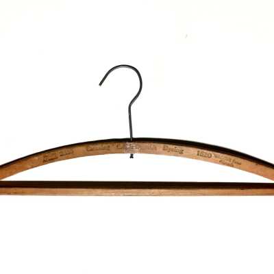 Wooden advertising hanger from California Cleaning and Dyeing Works, prior 1970