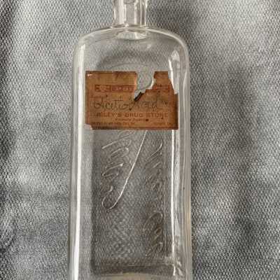 Bottle for acetic acid purchased at Riley's Drug Store, early 1900s