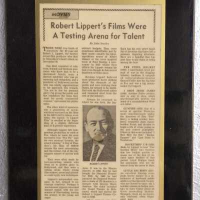 Plasticized plaque of Examiner and Chronicle Newspaper Clipping Plaque about Robert Lippert, 1976