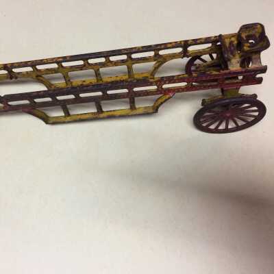 Iron Toy ladder truck with driver's seat, c. 1900