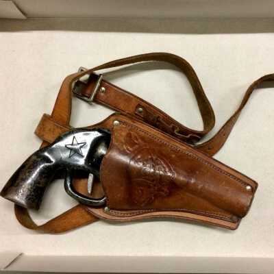 Iron Toy gun and leather holster of the Martin girls, c. 1930s