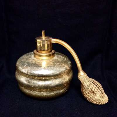 Circular perfume bottle with crackled gold lining, c. 1940s-1950s