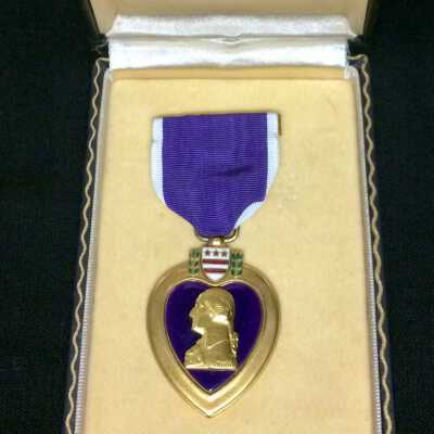 Purple Heart Medal awarded to USMC Pfc. Harold Gonsalves, c. 1945