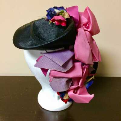 Cocktail hat of black horsehair with silk flowers and ribbons, 1940s