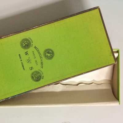 Green cardboard box with gold trim made in Germany, c. 1890s