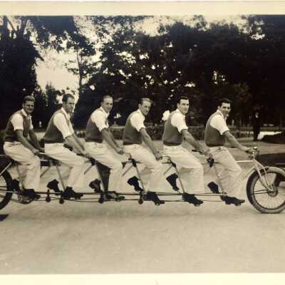 Postcard six-seat Amaral bicycle with riders, 1930s