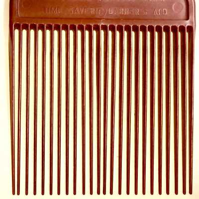 Long-toothed brown plastic comb, late 1950s, early 1960s
