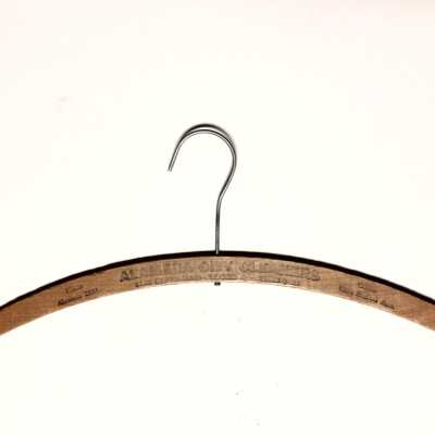 Wooden clothes hanger advertising the Alameda City Cleaning, c. 1930s