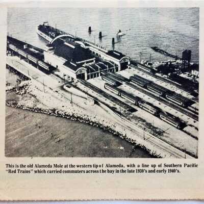 Clipping with photos of Mole and S. P. Red Trains, 1973