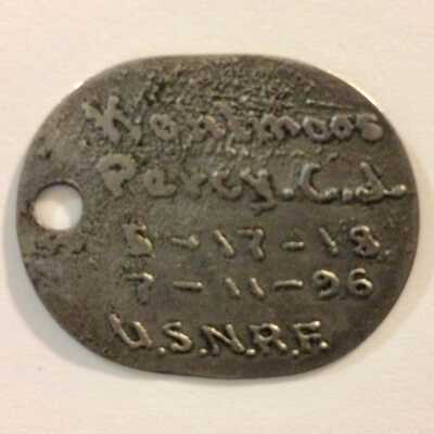 Oval aluminum WWI Navy dog tag of Percy ('Pete') Kohlmoos, 1918