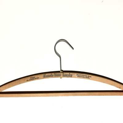 Wooden advertising Hanger of The alameda Steam Launder, before 1970