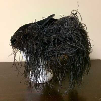 Black velvet hat with partially turned-up brim and waterfall black plumes, c. 1915-1916