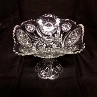 Clear-glass pedestal-base compote dish with floral design, early 1900s