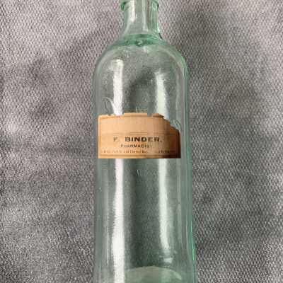 Medicine bottle with label from F. Binder Pharmacist, c. 1890s-early 1900s