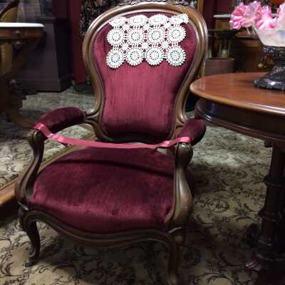 Ballonback Gentlemen's chair with padded arms and carved roses and leaves, c. 1860s
