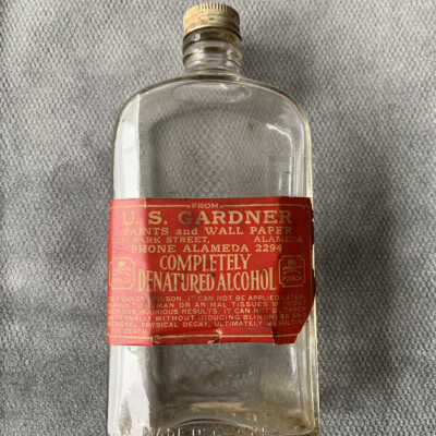 Bottle with denatured alchohol from U.S. Gardner paint store, 1920s or 1930s