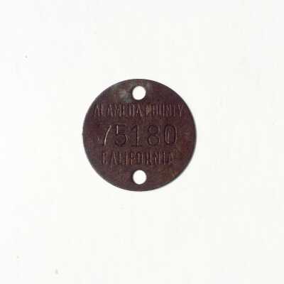 Civil Defense students' metal ID tag No. 75180, 1942
